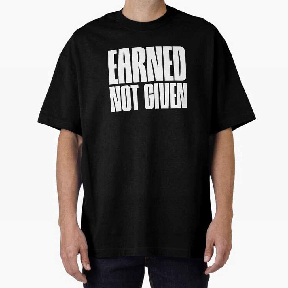 Earned not given white Oversized T-Shirt Join Supporters Worldwide for Global Football Passion for FIFA World Cup 2026, Inspired by Messi, Neymar and Mbappe, England, Football Passion, Legendary Performances, Festival Vibes and Supporter Community;