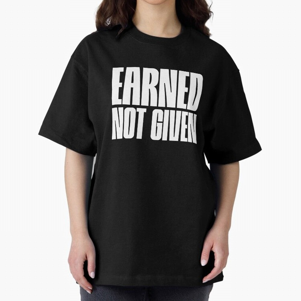 Earned not given white Oversized T-Shirt Join Supporters Worldwide for Global Football Passion for FIFA World Cup 2026, Inspired by Messi, Neymar and Mbappe, England, Football Passion, Legendary Performances, Festival Vibes and Supporter Community;
